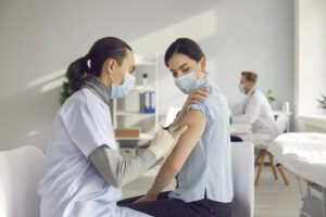 Young person getting a COVID-19 Vaccine