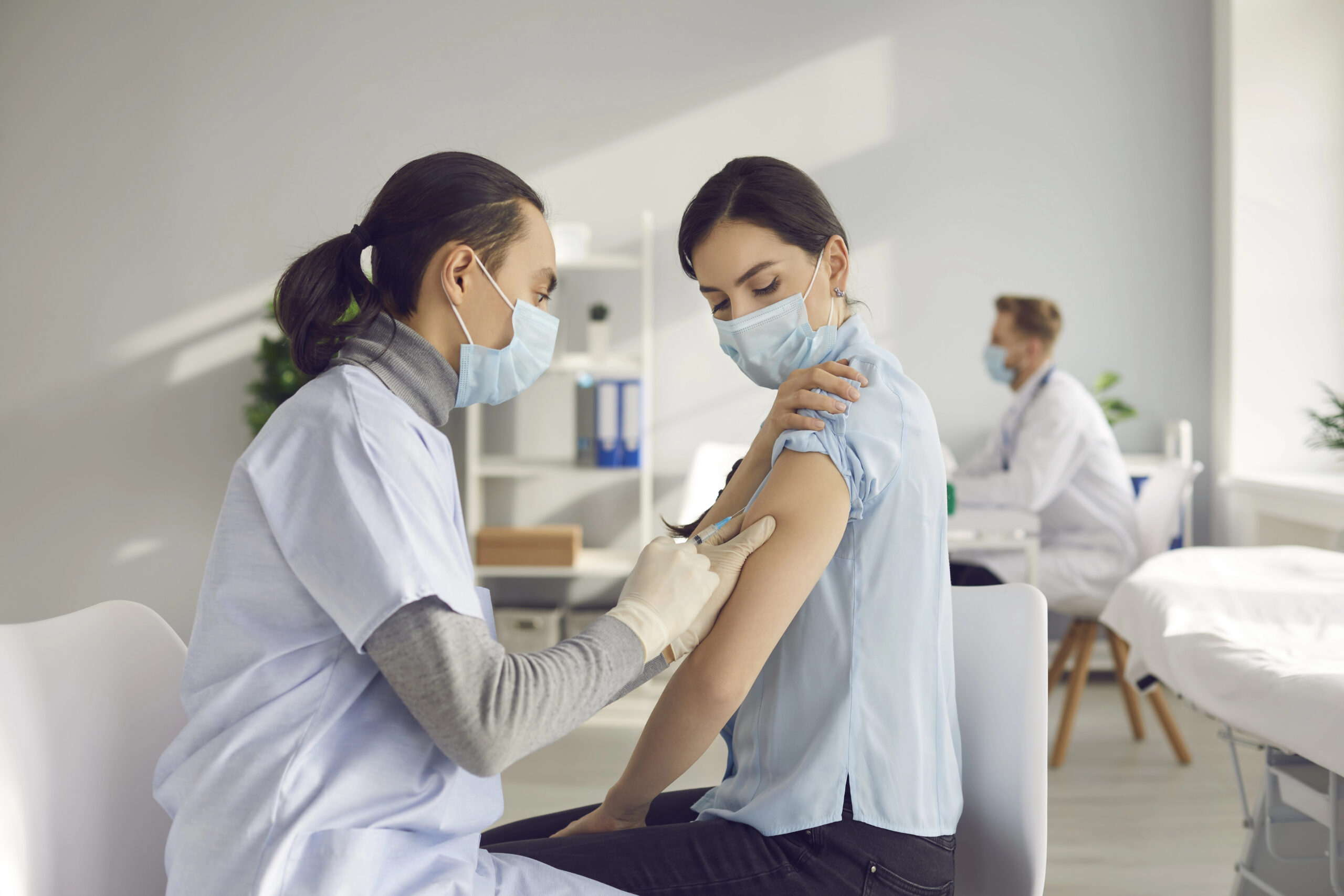 Young person getting a COVID-19 Vaccine